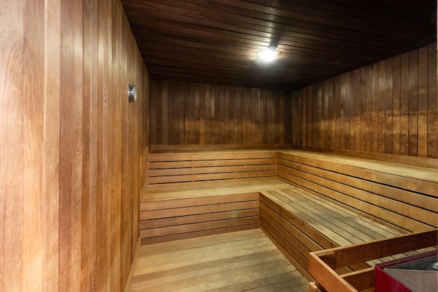 5100 San Felipe St Unit 98, Houston, TX 77056 - relaxing sauna / steam room with wooden walls, wood ceiling, and wood finished floors