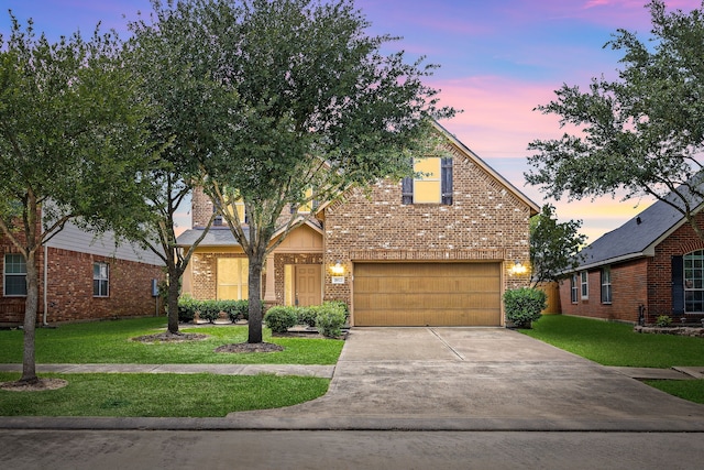 20522 Saddleback Chase Ln, Cypress, TX 77433 - view of front of house with brick siding, a garage, concrete driveway, and a lawn