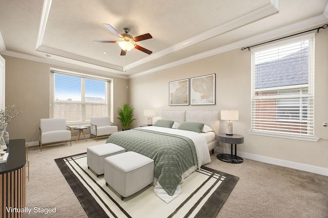 20522 Saddleback Chase Ln, Cypress, TX 77433 - bedroom with a raised ceiling, carpet floors, crown molding, baseboards, and a ceiling fan