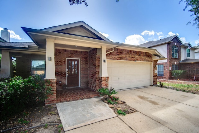 5811 Laramie River Ct, Katy, TX 77449 - view of front of house with brick siding, a garage, and driveway