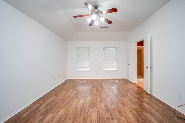 5811 Laramie River Ct, Katy, TX 77449 - unfurnished room featuring a ceiling fan, light wood-style flooring, vaulted ceiling, and baseboards