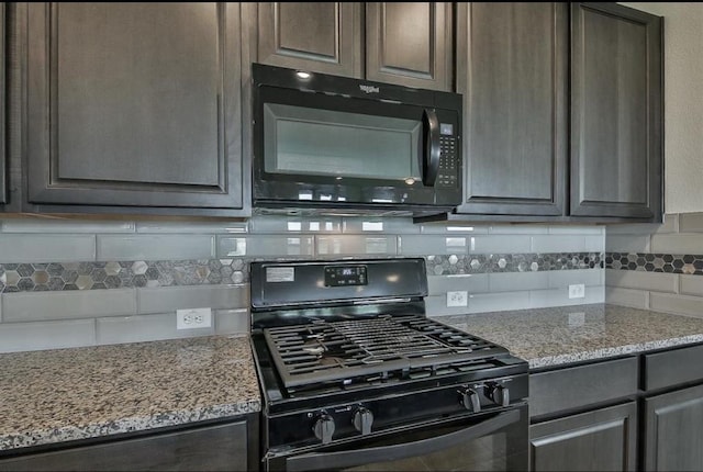 28430 Buffalo Fork Ln, Katy, TX 77494 - kitchen featuring black appliances, decorative backsplash, light stone counters, and dark brown cabinets