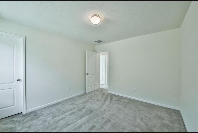 28430 Buffalo Fork Ln, Katy, TX 77494 - unfurnished bedroom featuring carpet flooring, baseboards, and a textured ceiling