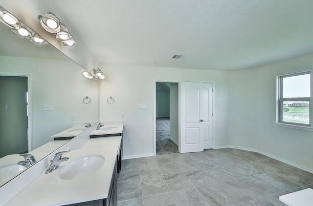 28430 Buffalo Fork Ln, Katy, TX 77494 - full bath with double vanity, baseboards, and tile patterned floors