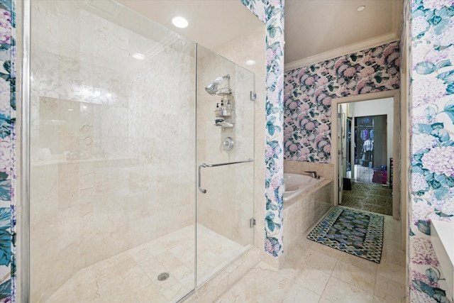 511 S Post Oak Ln Unit 6D, Houston, TX 77056 - bathroom with a shower stall, a bath, and ornamental molding