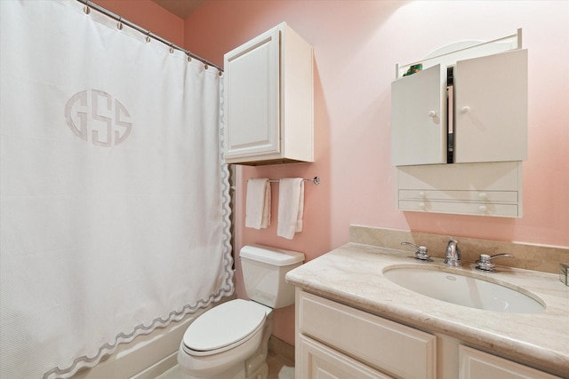 511 S Post Oak Ln Unit 6D, Houston, TX 77056 - bathroom featuring vanity, toilet, and shower / tub combo