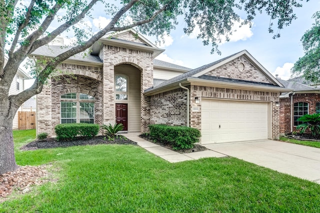 16906 Shoal Park Dr, Cypress, TX 77429 - french country home featuring brick siding, an attached garage, and concrete driveway