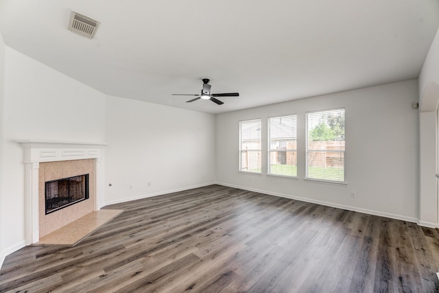 16906 Shoal Park Dr, Cypress, TX 77429 - unfurnished living room featuring dark wood-style flooring, ceiling fan, and baseboards