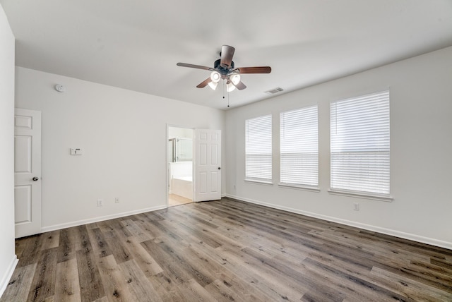 16906 Shoal Park Dr, Cypress, TX 77429 - spare room with ceiling fan, wood finished floors, and baseboards