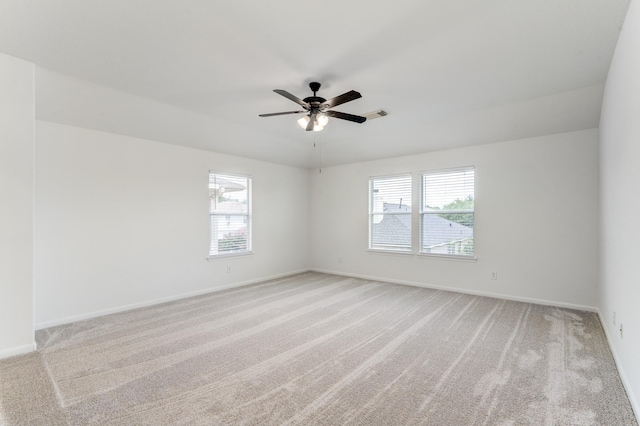 16906 Shoal Park Dr, Cypress, TX 77429 - empty room with light colored carpet, ceiling fan, and baseboards