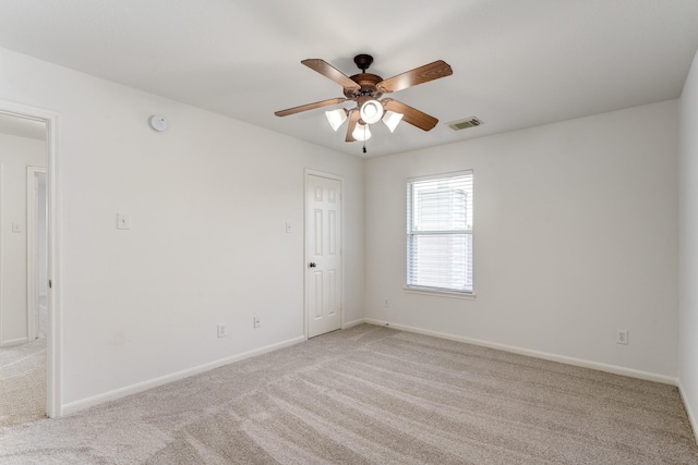 16906 Shoal Park Dr, Cypress, TX 77429 - carpeted empty room featuring a ceiling fan, baseboards, and a smoke detector