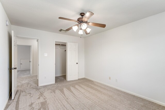 16906 Shoal Park Dr, Cypress, TX 77429 - unfurnished bedroom with light carpet, a closet, baseboards, and ceiling fan