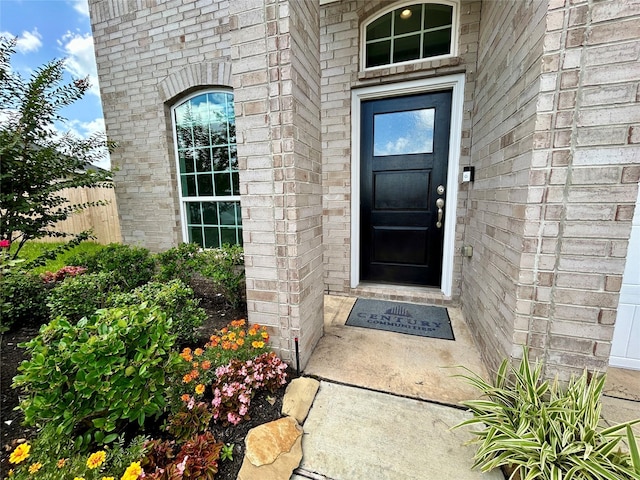 7 Riverwood Circle Ct, Angleton, TX 77515 - doorway to property with brick siding