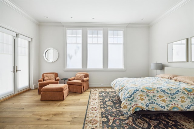 2023 Drexel Dr, Houston, TX 77027 - bedroom with crown molding, multiple windows, and light wood-type flooring