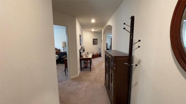 21138 Titian Dr, Magnolia, TX 77355 - hallway with arched walkways and light carpet