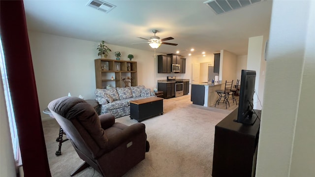 21138 Titian Dr, Magnolia, TX 77355 - living area featuring ceiling fan and light colored carpet