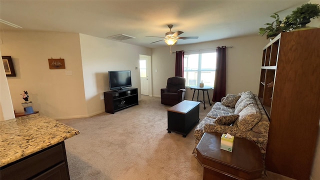 21138 Titian Dr, Magnolia, TX 77355 - living room featuring ceiling fan, light carpet, and baseboards