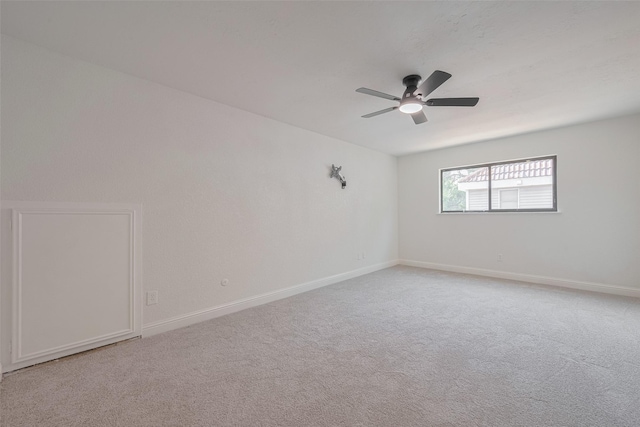 8014 Wray Ct, Houston, TX 77088 - empty room featuring ceiling fan, light carpet, and baseboards