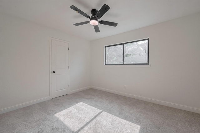 8014 Wray Ct, Houston, TX 77088 - empty room with light carpet, baseboards, and ceiling fan