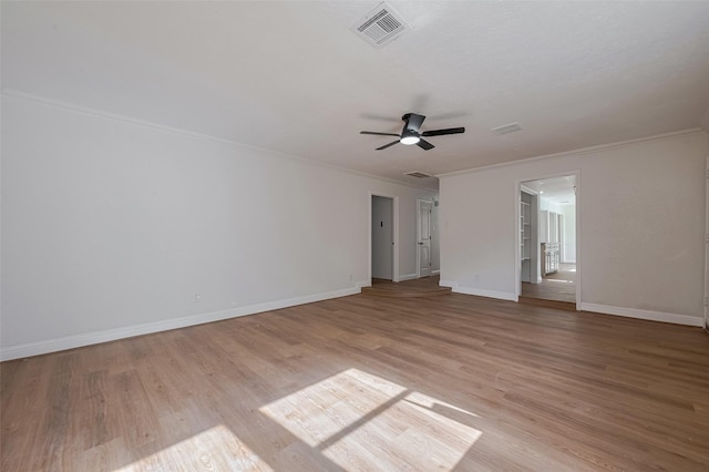 8014 Wray Ct, Houston, TX 77088 - unfurnished room featuring ornamental molding, light wood-type flooring, a ceiling fan, and baseboards