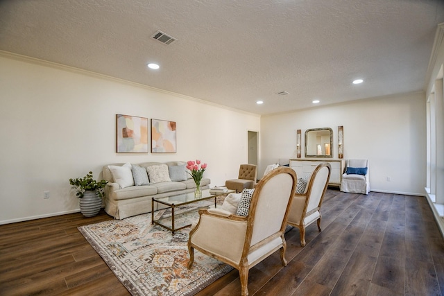 6014 Franz Ct, Katy, TX 77493 - living area with dark wood finished floors, a textured ceiling, recessed lighting, baseboards, and crown molding