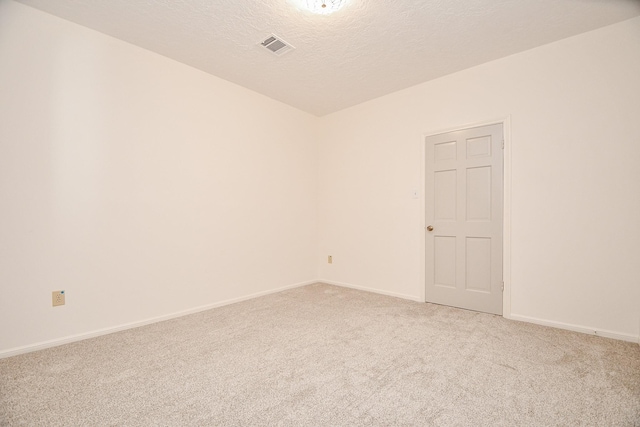 6014 Franz Ct, Katy, TX 77493 - spare room with light carpet, a textured ceiling, and baseboards