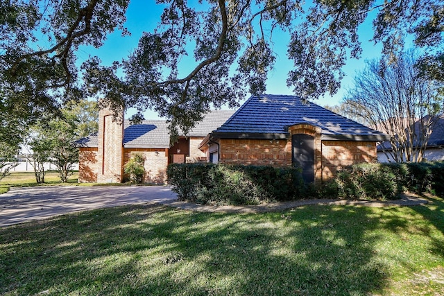 6014 Franz Ct, Katy, TX 77493 - view of front facade featuring brick siding and a front yard