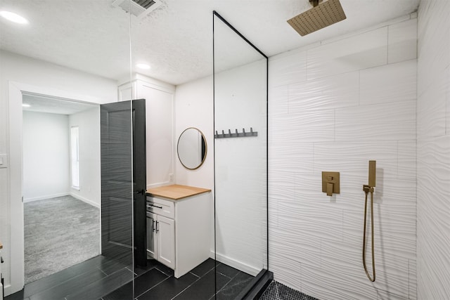 150 Squires Bnd, Stafford, TX 77477 - full bath featuring a walk in shower, vanity, recessed lighting, and baseboards