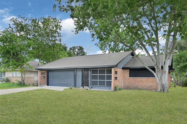 627 Edgebrook Dr, Houston, TX 77034 - single story home featuring brick siding, a garage, driveway, a front lawn, and a shingled roof