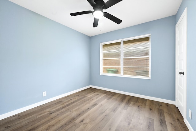 627 Edgebrook Dr, Houston, TX 77034 - unfurnished room with baseboards, wood finished floors, and ceiling fan