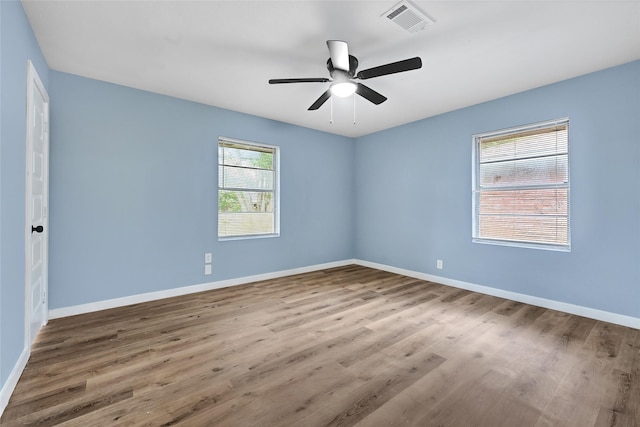627 Edgebrook Dr, Houston, TX 77034 - unfurnished room with wood finished floors, baseboards, and ceiling fan