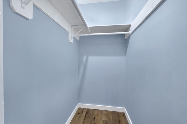 627 Edgebrook Dr, Houston, TX 77034 - walk in closet featuring dark wood-type flooring