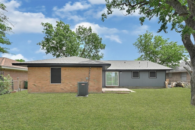 627 Edgebrook Dr, Houston, TX 77034 - rear view of house featuring central air condition unit, brick siding, and a patio area