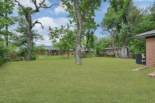 627 Edgebrook Dr, Houston, TX 77034 - view of yard with central air condition unit