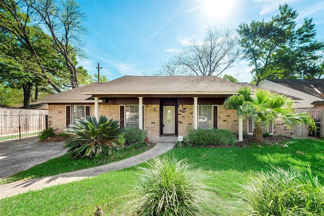 6310 Ash Oak Dr, Houston, TX 77091 - ranch-style house featuring brick siding and roof with shingles