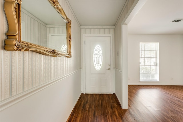 6310 Ash Oak Dr, Houston, TX 77091 - foyer entrance with wood finished floors, ornamental molding, and baseboards