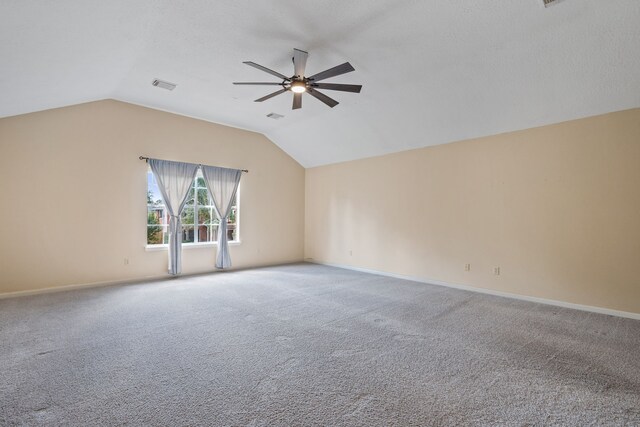 4309 Kingfish Dr, Seabrook, TX 77586 - carpeted empty room with a ceiling fan, lofted ceiling, and baseboards