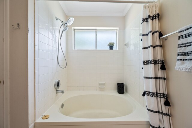4309 Kingfish Dr, Seabrook, TX 77586 - bathroom featuring shower / tub combo with curtain and ornamental molding