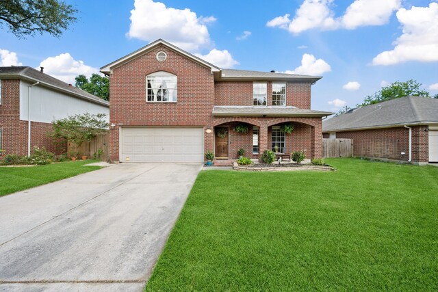 4309 Kingfish Dr, Seabrook, TX 77586 - traditional-style house featuring brick siding, a garage, concrete driveway, and a porch