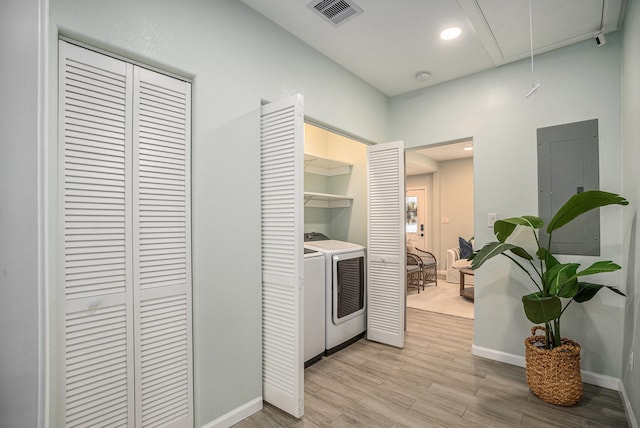1014 11th St, Galveston, TX 77550 - washroom featuring attic access, washing machine and dryer, light wood-style flooring, baseboards, and recessed lighting