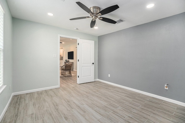 1014 11th St, Galveston, TX 77550 - empty room with ceiling fan, light wood-style flooring, baseboards, and recessed lighting