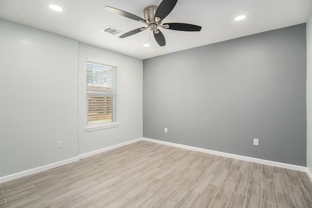 1014 11th St, Galveston, TX 77550 - unfurnished room with a ceiling fan, light wood-style flooring, baseboards, and recessed lighting