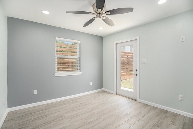 1014 11th St, Galveston, TX 77550 - spare room featuring light wood-style flooring, ceiling fan, baseboards, and recessed lighting