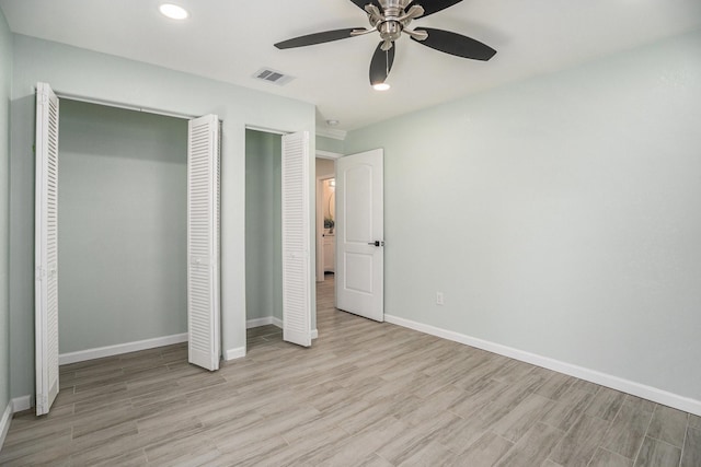 1014 11th St, Galveston, TX 77550 - unfurnished bedroom with light wood-type flooring, baseboards, a closet, a ceiling fan, and recessed lighting