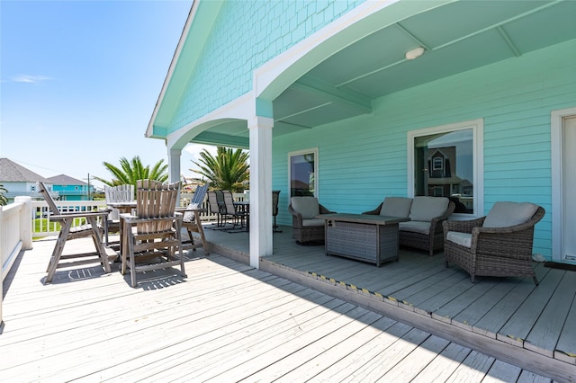 2585 Tide Dr, Crystal Beach, TX 77650 - wooden deck featuring an outdoor living space