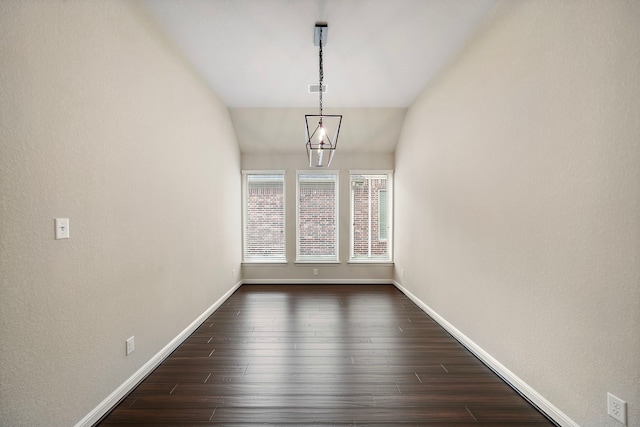 19119 Cardinal Grove Ct, Cypress, TX 77429 - unfurnished dining area featuring dark wood-style flooring and lofted ceiling