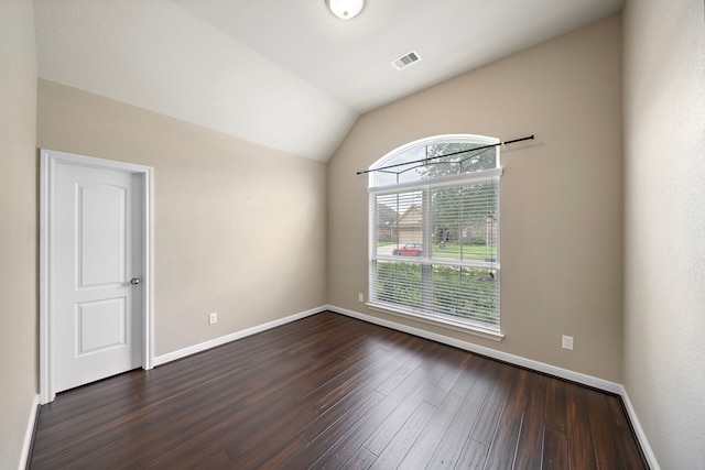 19119 Cardinal Grove Ct, Cypress, TX 77429 - spare room with lofted ceiling and dark wood finished floors