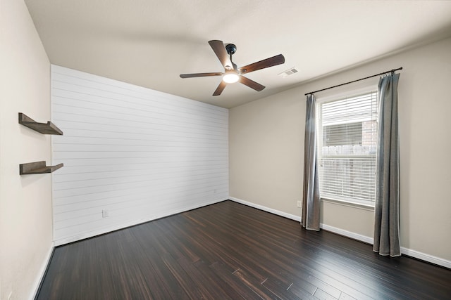 19119 Cardinal Grove Ct, Cypress, TX 77429 - empty room with ceiling fan and dark wood-type flooring