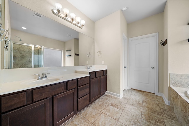 19119 Cardinal Grove Ct, Cypress, TX 77429 - bathroom with double vanity, a garden tub, and a tile shower