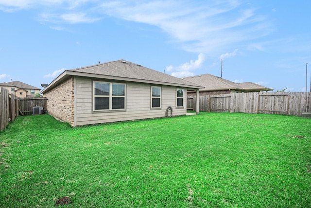 607 Harvest Bluff Dr, Rosharon, TX 77583 - back of house with cooling unit, brick siding, and roof with shingles